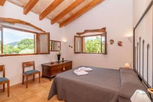 Posteľ alebo postele v izbe v ubytovaní Villa Cal Beato by Sealand Villas