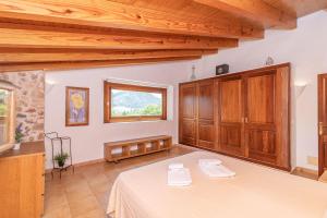 Posteľ alebo postele v izbe v ubytovaní Villa Cal Beato by Sealand Villas