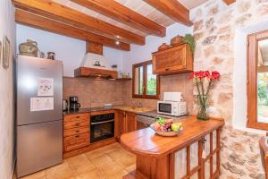 Kuchyňa alebo kuchynka v ubytovaní Villa Cal Beato by Sealand Villas