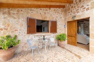 Patio alebo iná vonkajšia časť ubytovania Villa Cal Beato by Sealand Villas