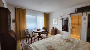 En eller flere senge i et værelse på Innere Stadt Apartment (am Ring)