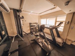 a gym with cardio equipment in a room at Sol Ipanema Hotel in Rio de Janeiro
