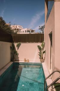 Πισίνα στο ή κοντά στο Sorores Villa Seaside Living,By IdealStay Experience