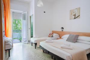Postel nebo postele na pokoji v ubytování Hotel Sayonara