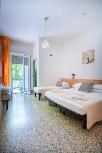 Postel nebo postele na pokoji v ubytování Hotel Sayonara