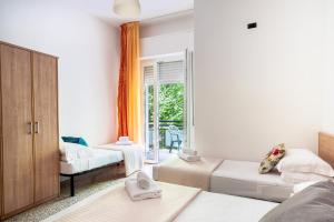 Postel nebo postele na pokoji v ubytování Hotel Sayonara