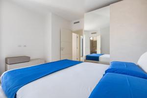 En eller flere senge i et værelse på Attico Smeraldo by Perle di Puglia + 42 billeder