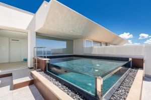 Swimmingpoolen hos eller tæt på Attico Smeraldo by Perle di Puglia