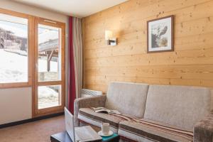 Ein Sitzbereich in der Unterkunft Résidence Pierre & Vacances Le Quartz