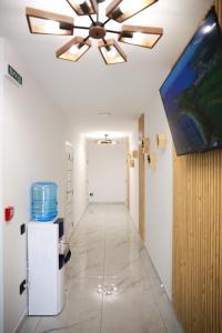 TV a/nebo společenská místnost v ubytování M-23 Hotel