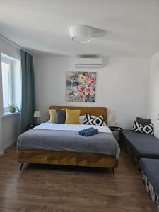 Posteľ alebo postele v izbe v ubytovaní Apartmány Centro & Jacuzzi + 37 fotografií