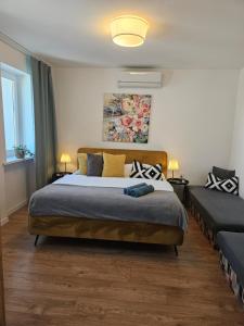 Posteľ alebo postele v izbe v ubytovaní Apartmány Centro & Jacuzzi