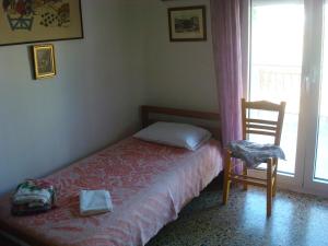 Ένα ή περισσότερα κρεβάτια σε δωμάτιο στο Plataria Houses