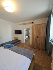 Posteľ alebo postele v izbe v ubytovaní Apartmány Centro & Jacuzzi