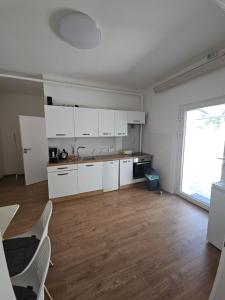 Kuchyňa alebo kuchynka v ubytovaní Apartmány Centro & Jacuzzi