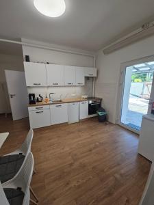 Kuchyňa alebo kuchynka v ubytovaní Apartmány Centro & Jacuzzi