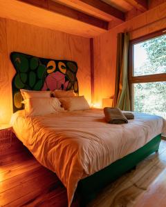 a bedroom with a bed in a room with a window at Domaine de Ribeaugoutte in Saint-Nabord +115 photos