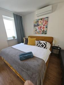 Posteľ alebo postele v izbe v ubytovaní Apartmány Centro & Jacuzzi