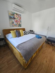 Posteľ alebo postele v izbe v ubytovaní Apartmány Centro & Jacuzzi