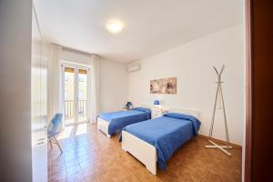 Postel nebo postele na pokoji v ubytování Tidu's home B&B