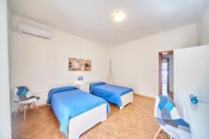 Postel nebo postele na pokoji v ubytování Tidu's home B&B