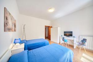 TV a/nebo společenská místnost v ubytování Tidu's home B&B