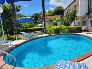 Bazén v ubytovaní Holiday home in Lovran 15113 alebo v jeho blízkosti