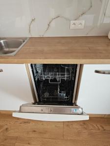 Kuchyňa alebo kuchynka v ubytovaní Apartmány Centro & Jacuzzi