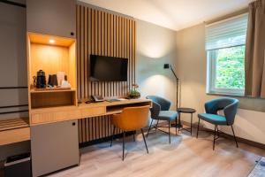 TV a/nebo společenská místnost v ubytování Hotel Kontakt der Kontinenten