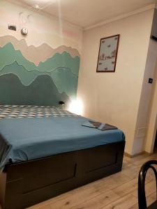 A bed or beds in a room at Rosa Bianca