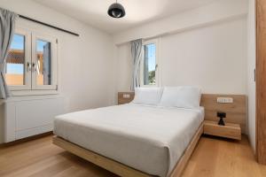 Ein Bett oder Betten in einem Zimmer der Unterkunft Rhodes Island View