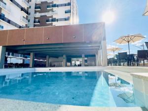 A piscina localizada em diRoma Spazzio direto com o Grupo diRoma com acesso ao Acqua Park e Café da manhã ou nos arredores