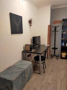 A television and/or entertainment centre at Rosa Bianca