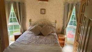 Кровать или кровати в номере Mablethorpe Luxury Caravan Rental