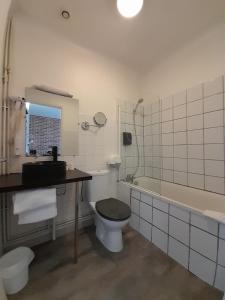 Koupelna v ubytování Hotel Au Spatial