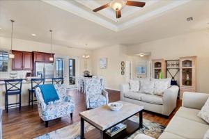 a living room with a couch and a table at 10333 Monticello Dr in Port Charlotte