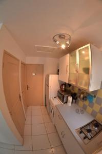 Kuchyň nebo kuchyňský kout v ubytování Maisonnette 37 m2 Wi-Fi, PKG, Clim