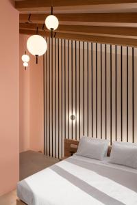 Ein Bett oder Betten in einem Zimmer der Unterkunft Rhodes Island View