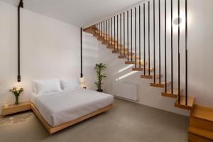 Ein Bett oder Betten in einem Zimmer der Unterkunft Rhodes Island View