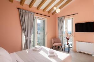 Ein Bett oder Betten in einem Zimmer der Unterkunft Rhodes Island View