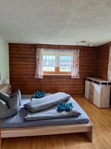 Posteľ alebo postele v izbe v ubytovaní Ferienhof Bichlhof