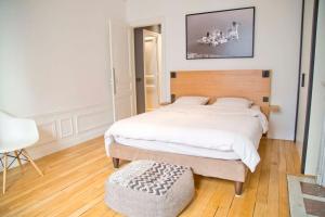 Letto o letti in una camera di Luxury Apt Paris 7 Invalides Tour Eiffel
