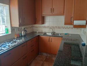 Η κουζίνα ή μικρή κουζίνα στο Moonlight Guest House +93 φωτογραφίες