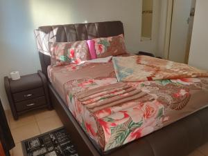 Ένα ή περισσότερα κρεβάτια σε δωμάτιο στο Moonlight Guest House