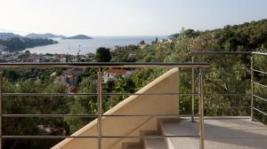 a view of the ocean from a balcony at ApoLoveSea in Megali Ammos