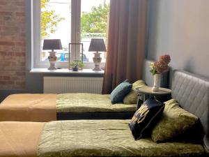 Posedenie v ubytovaní Nowy apartament studio Długa