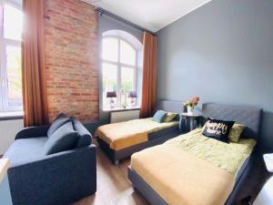 Posedenie v ubytovaní Nowy apartament studio Długa