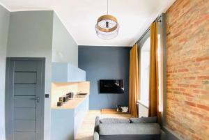 Kuchyňa alebo kuchynka v ubytovaní Nowy apartament studio Długa