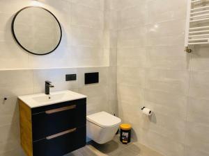 Kúpeľňa v ubytovaní Nowy apartament studio Długa