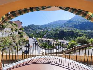 a view of a mountain from a balcony at gardeniapartment in Minori